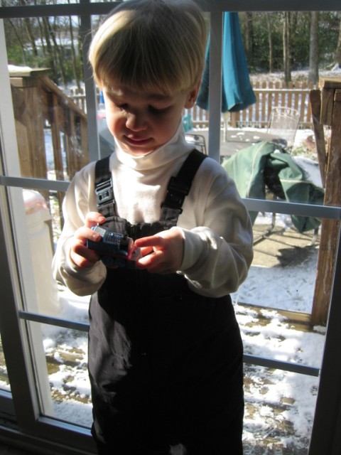 I'm getting ready to go out and play in the snow!  The snow!  The SNOW!  I sure hope someone captures this moment on video to preserve it forever!