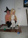 Halloween, 2005.  They dressed me up as a lion.  Oh well, at least they didn't paint circles on my cheeks like the Wizard of Oz lion I saw at the zoo last year.